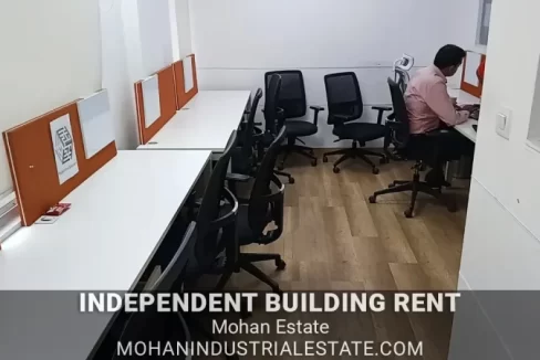 Grand double height reception lobby in Mohan Cooperative