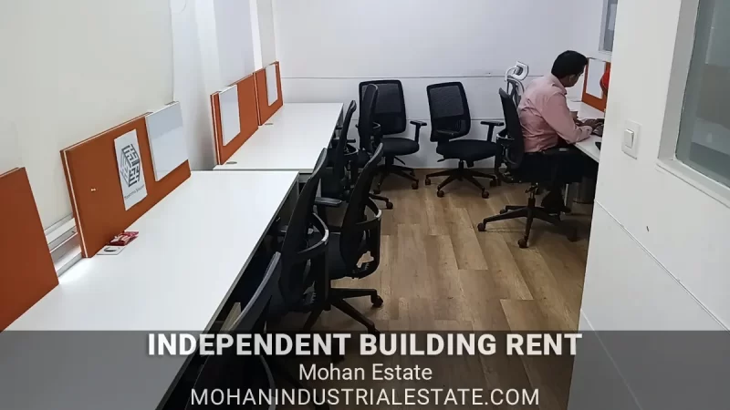 Grand double height reception lobby in Mohan Cooperative