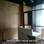 Renovated office floor with modern lighting and high-speed lifts near Sarita Vihar.