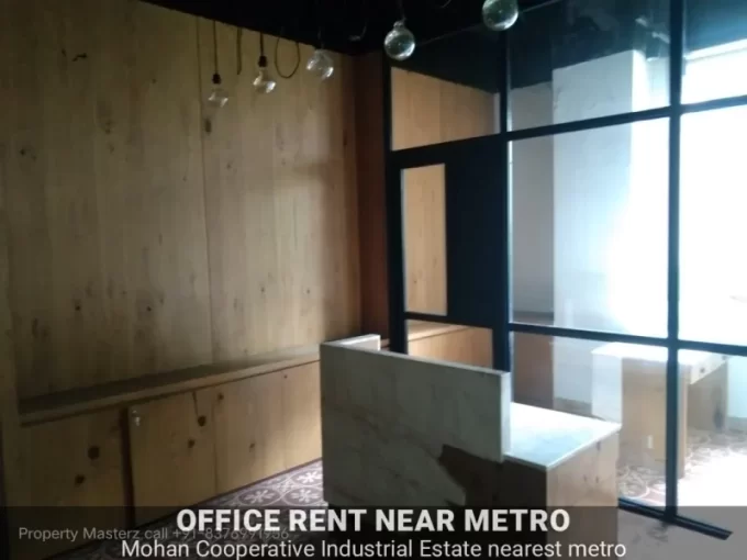Renovated office floor with modern lighting and high-speed lifts near Sarita Vihar.