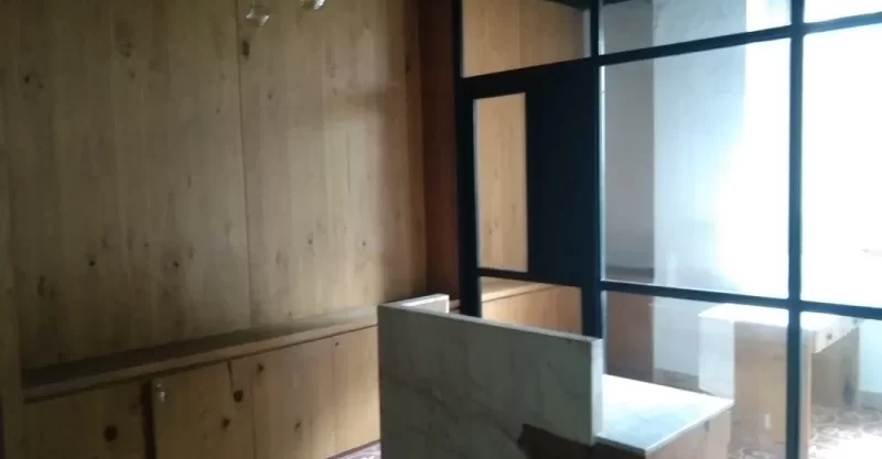 Renovated office floor with modern lighting and high-speed lifts near Sarita Vihar.